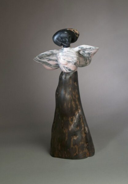 contemporary figurative sculpture stone wood