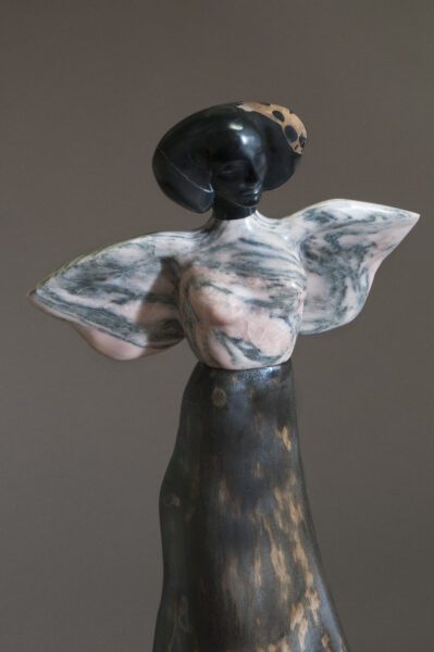 contemporary figurative sculpture stone wood